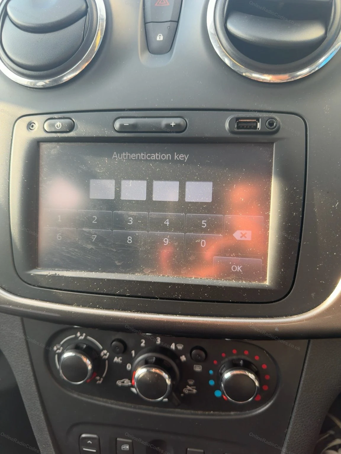 Authentication key entry screen on the touchscreen
