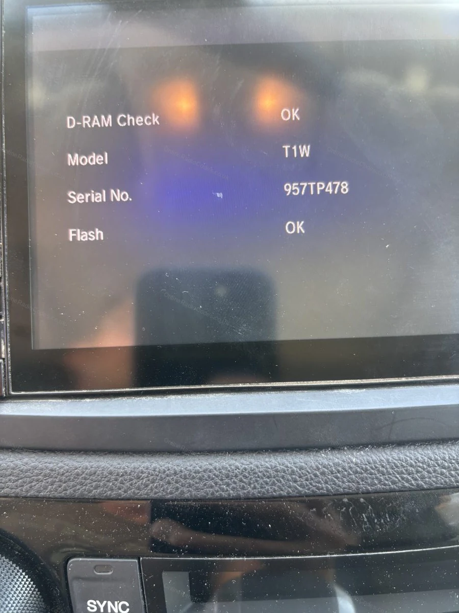 Diagnostic screen on a Honda display showing the model and serial number