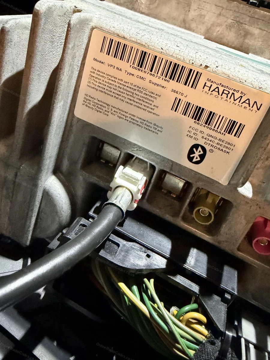 Manufacturer label on the casing of a Uconnect unit
