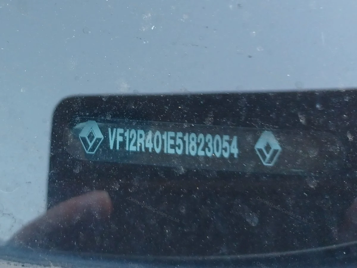 VIN visible at the base of the windscreen