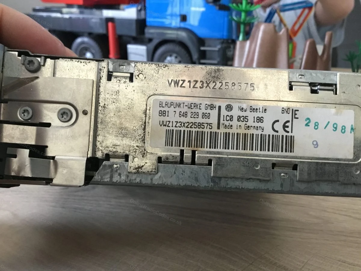 Label on the top of the unit, with the VWZ serial also engraved in the metal